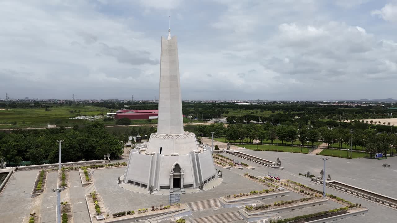 Aerial footage above the Win Win memorial monument, Phnom Penh, Cambodia. Camera spin around the monument from right to left