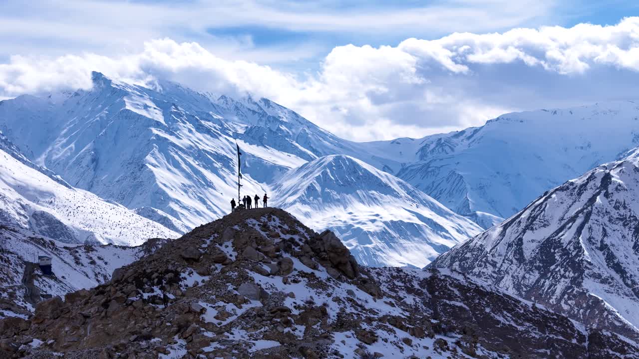 Snowy Himalayan Mountains with Hikers