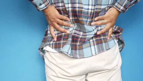man experiencing back pain