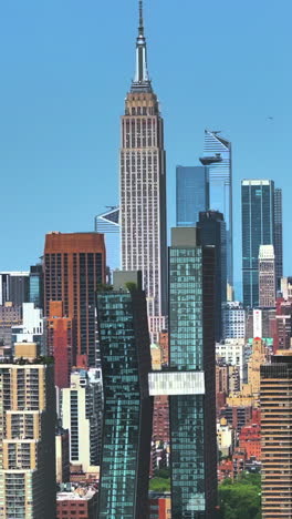 aerial tracking shot revealing the iconic skyscrapers of manhattan, new york