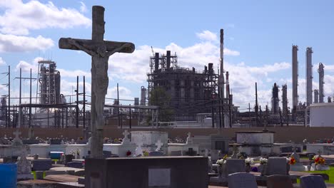 a cemetery or graveyard in louisiana exists adjacent to a huge petrochemical plant 15