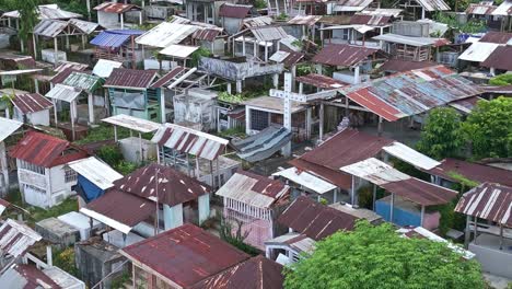 aerial flyover of bacuag catholic cemetery in surigao del norte, philippines