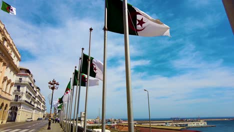 algerian flag in the boulvard of the seafront of algiers - slow motion