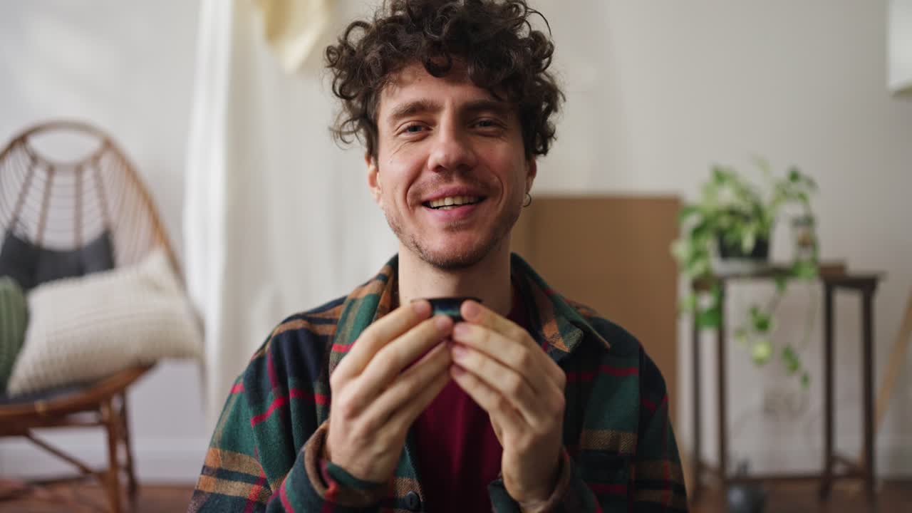 Man enjoying a cup of tea at home