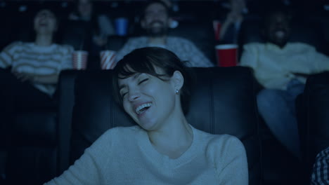 people laughing in a movie theater
