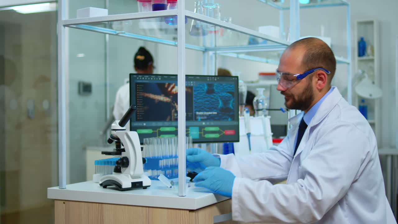 Biologist doctor checking DNA samples