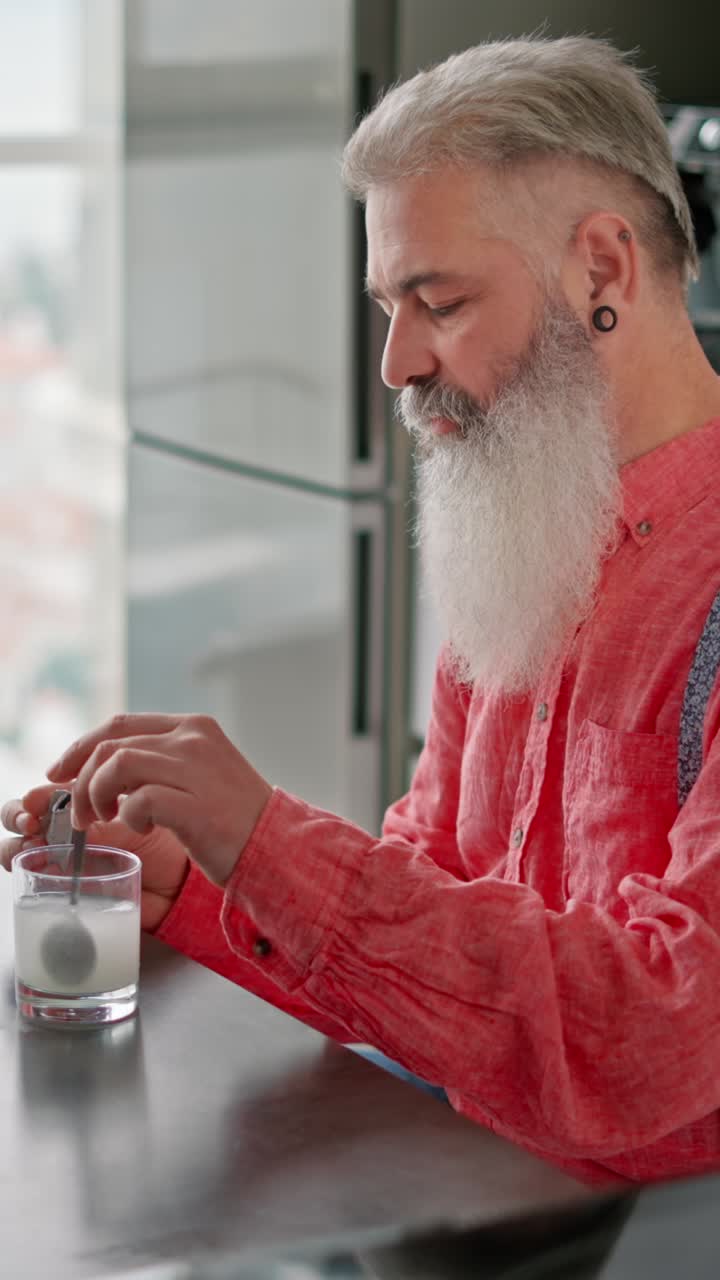 Man Taking a Supplement