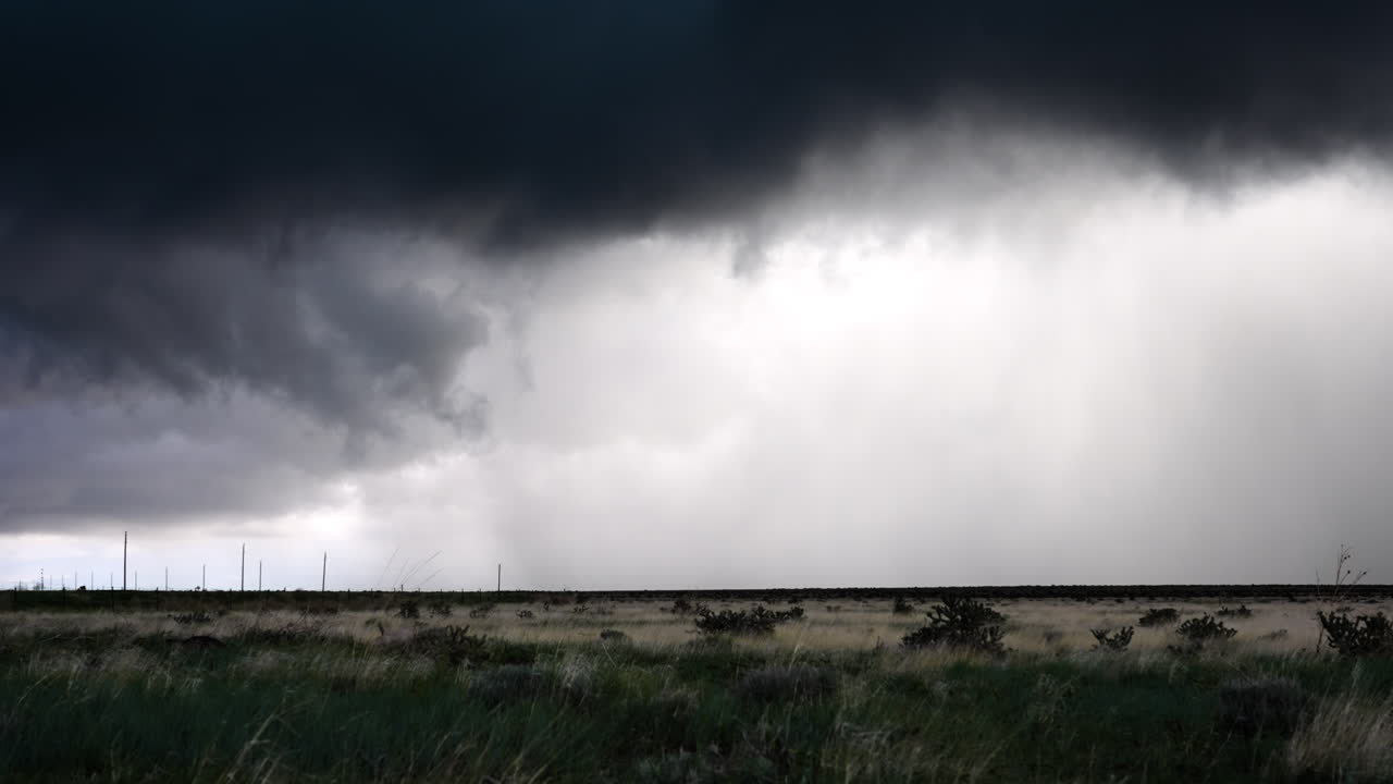Moody Clouds Darken The Sky As They Move Overhead Turning Light To Dark