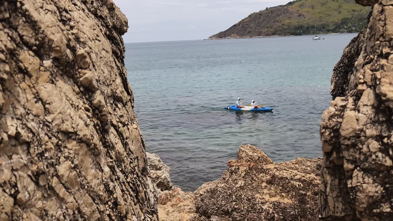 Kayaking in a beautiful coastal scene