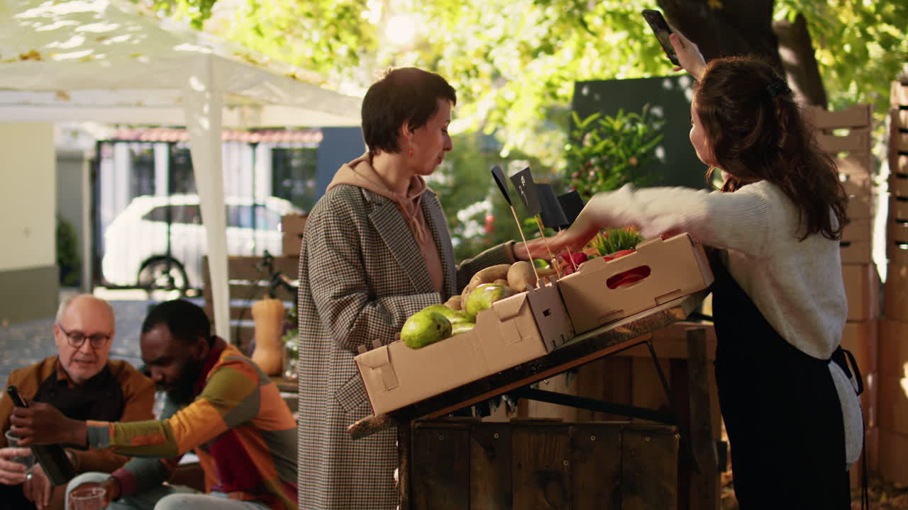People shopping for fresh produce at a farmers market