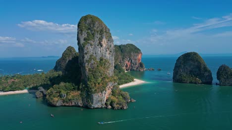 cliff rocks of railay beach in krabi thailand - aerial drone shot