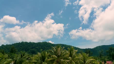 4K-Cinematic-nature-drone-footage-of-a-panoramic-aerial-view-of-the-beautiful-beaches-and-mountains-on-the-island-of-Koh-Lanta-in-Krabi,-South-Thailand,on-a-sunny-day