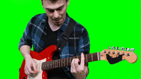 male musician playing guitar
