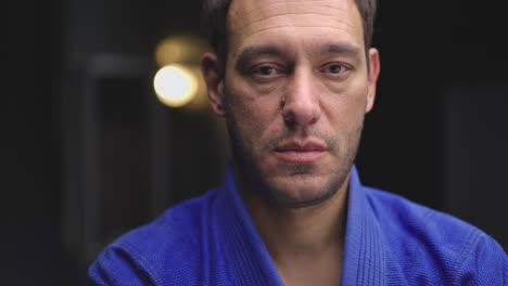 man in blue gi