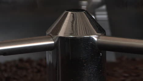 coffee beans drum roaster mixing closeup