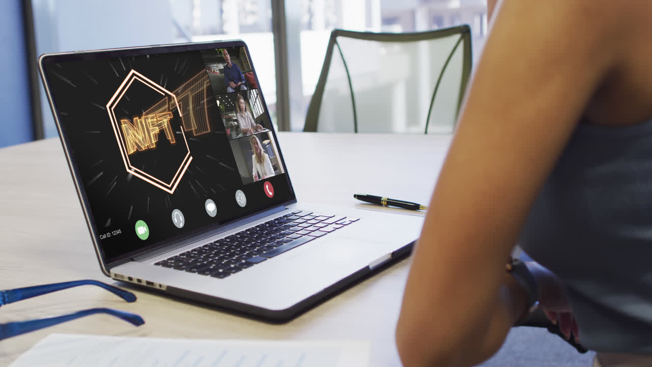 Video of biracial woman having nft video call with coworkers