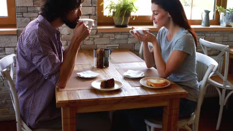 couple having coffee in cafe