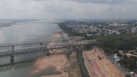 aerial view of a railway bridge over the tungabhadra river in kurnool, india