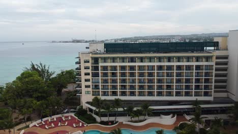 drone flying alone a barbados resort on a cloudy day