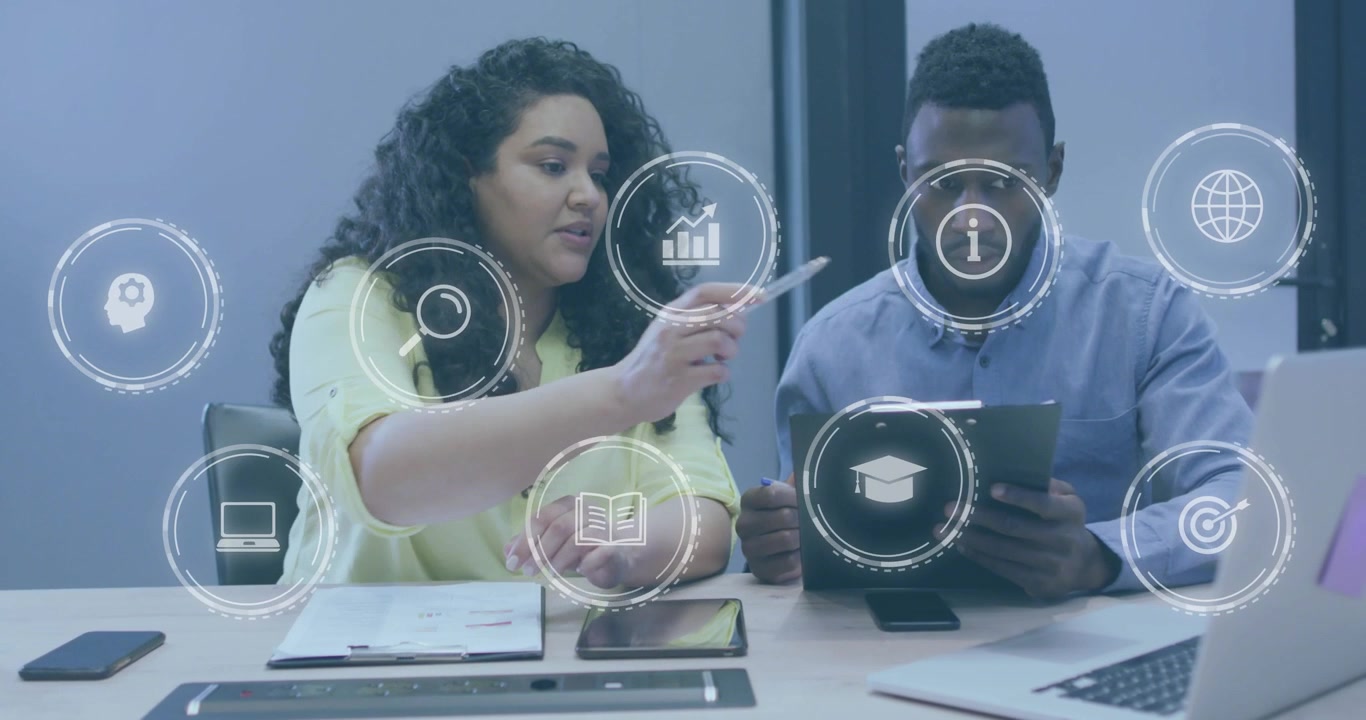 woman placing pen on tablet, guiding man through business data analysis with floating icons