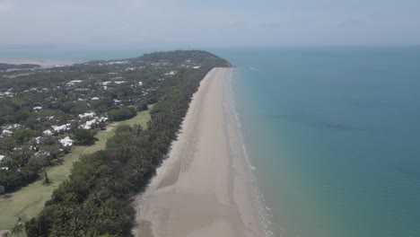 long stretch of four mile beach along with the sheraton grand mirage resort in port douglas, australia