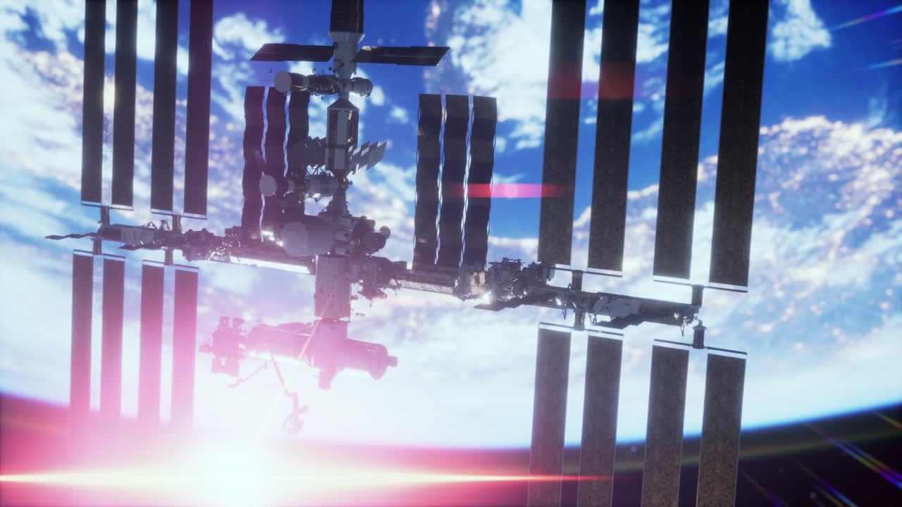 지구와 국제 우주 정거장이 지구 주위를 공전하고 있습니다.