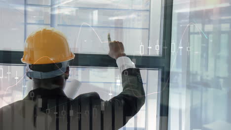 architect studying plans in the office