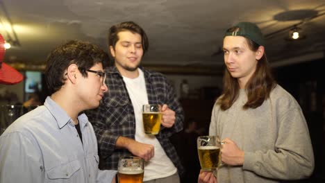friends enjoying beer at a pub