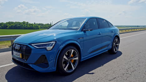 audi e-tron sport 2021. audi e-tron car moving on the road
