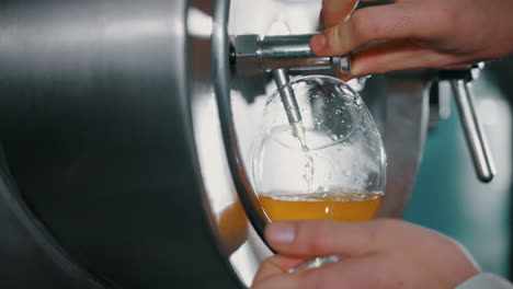 pouring beer from brewery tap