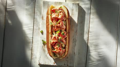 Gourmet-Lobster-Roll-Sandwich-on-Rustic-Wooden-Board