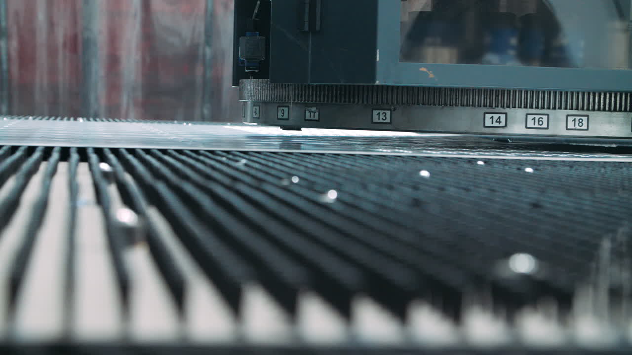 Stamping equipment working in metalworking work shop. Modern technology