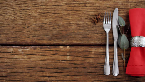 various cutlery on wooden table 4k