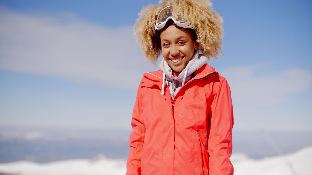 Young skier tilting her head to the side