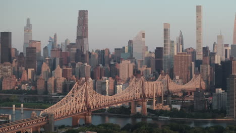 new york city's queensboro bridge at sunrise