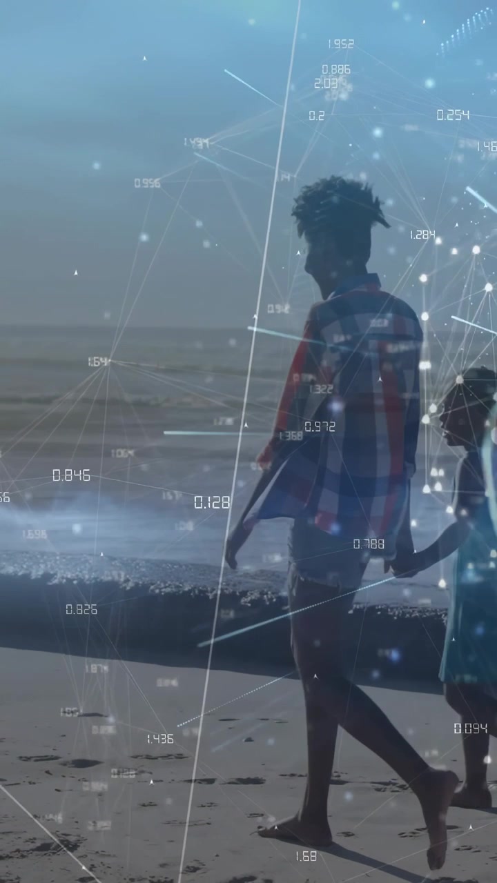 Vertical video: Man walking along beach from right, bonding with child while overlaying tech nodes