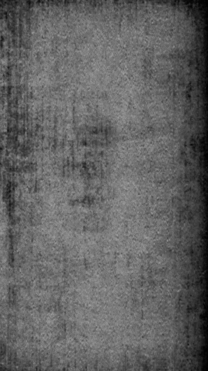 Grungy Black and White Film Grain Texture Background