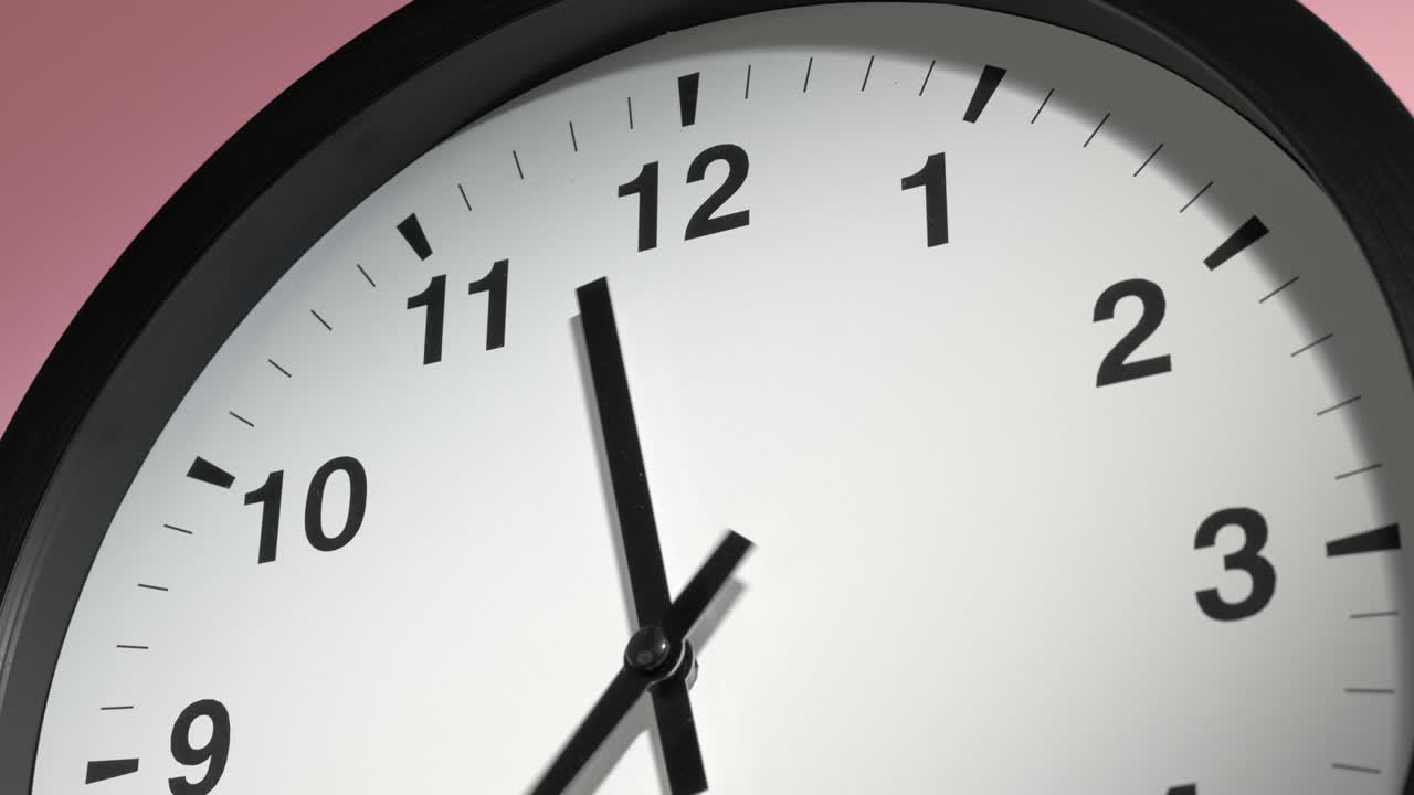 Clock Face on Rosy Rose Pink Wall in Time Lapse