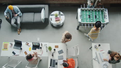 modern co-working space with people working and relaxing