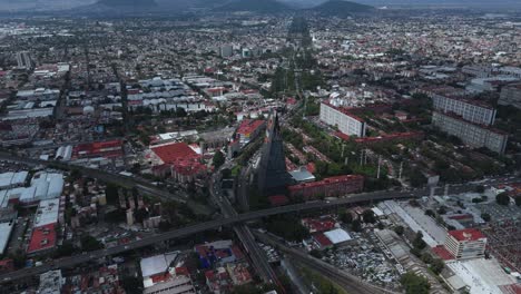 elevated shot of the banobras tower in cdmx, filmed by a drone