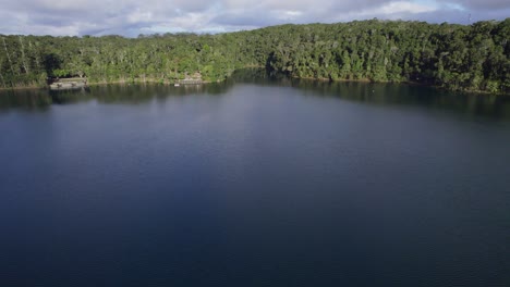 lake eacham with serene water in atherton tablelands, qld, australia - aerial drone shot