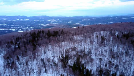 aerial footage taken by drone of beautiful winter landscapes in northern lyndon, vermont