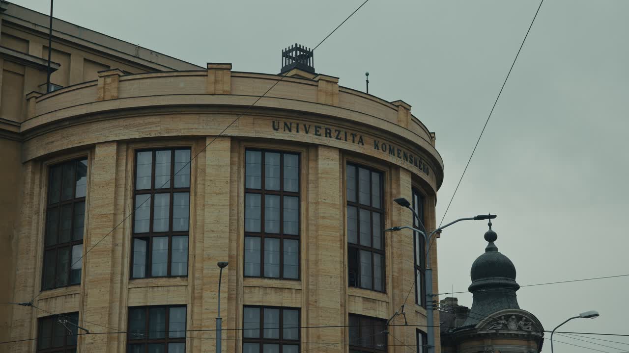 Komenský University historic facade with large windows in Bratislava