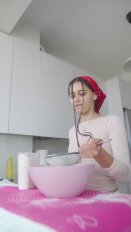 teenager baking in a kitchen