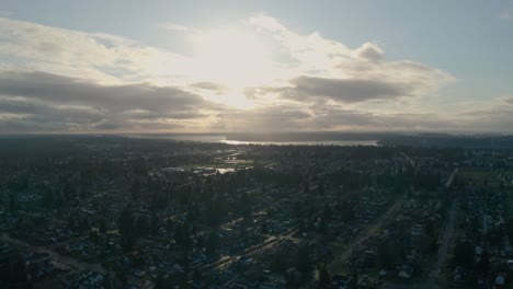 scenic view of sunrise sky over peaceful neighborhood by the puget sound at north end tacoma, washington