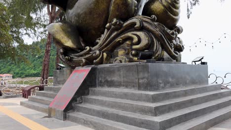 large conch statue with intricate design details