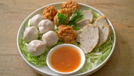 boiled fish balls, shrimp balls and chinese fish sausage with spicy dipping sauce