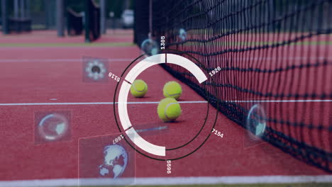 two yellow tennis balls being highlighted near net on red court, showing holographic ui icons