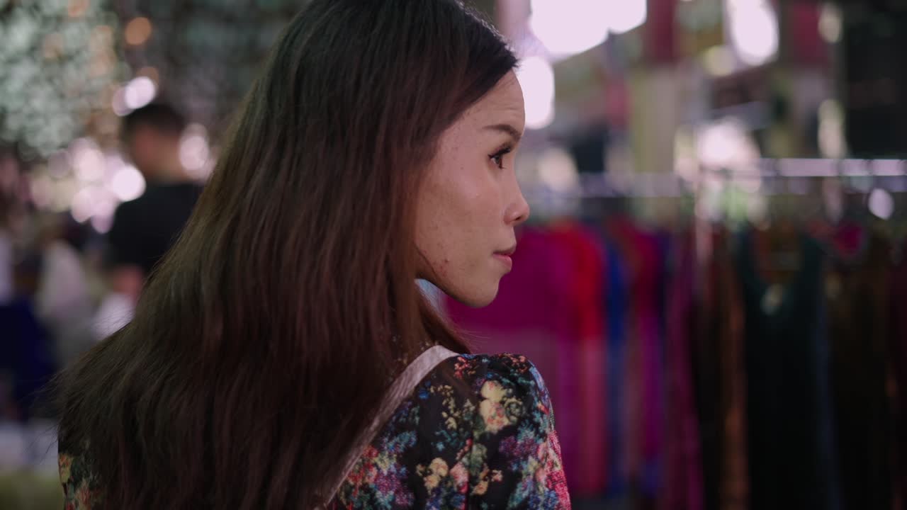 Woman walking through a vibrant market