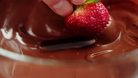 dipping strawberries in chocolate
